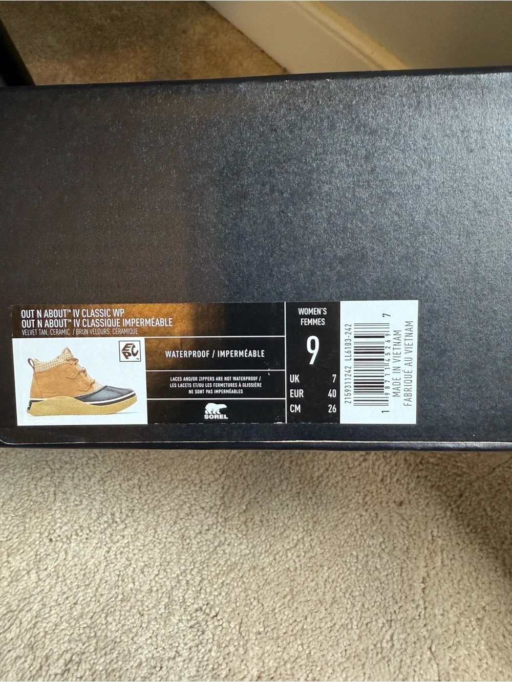 Sorel Out N About™ IV Women's Waterproof Boots in Black & Tan